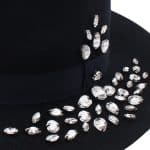 Black hat with white crystals