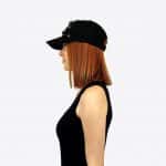 maeva wearing black rhinestone cap by on aura tout vu